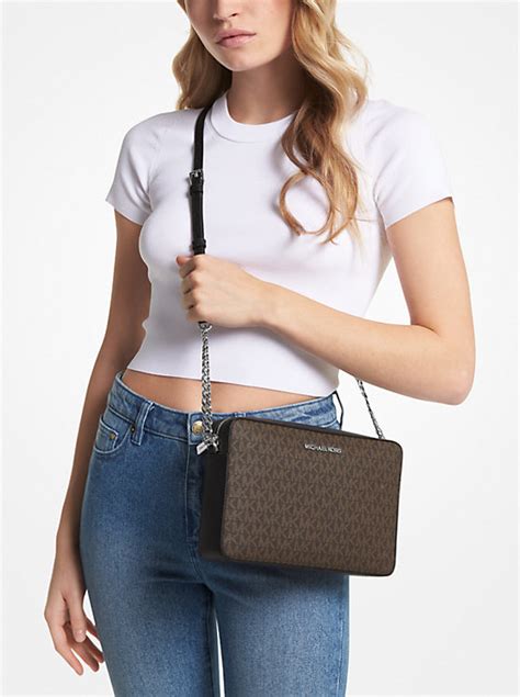 michael kors snap pocket crossbody|Jet Set Large Signature Logo Crossbody Bag .